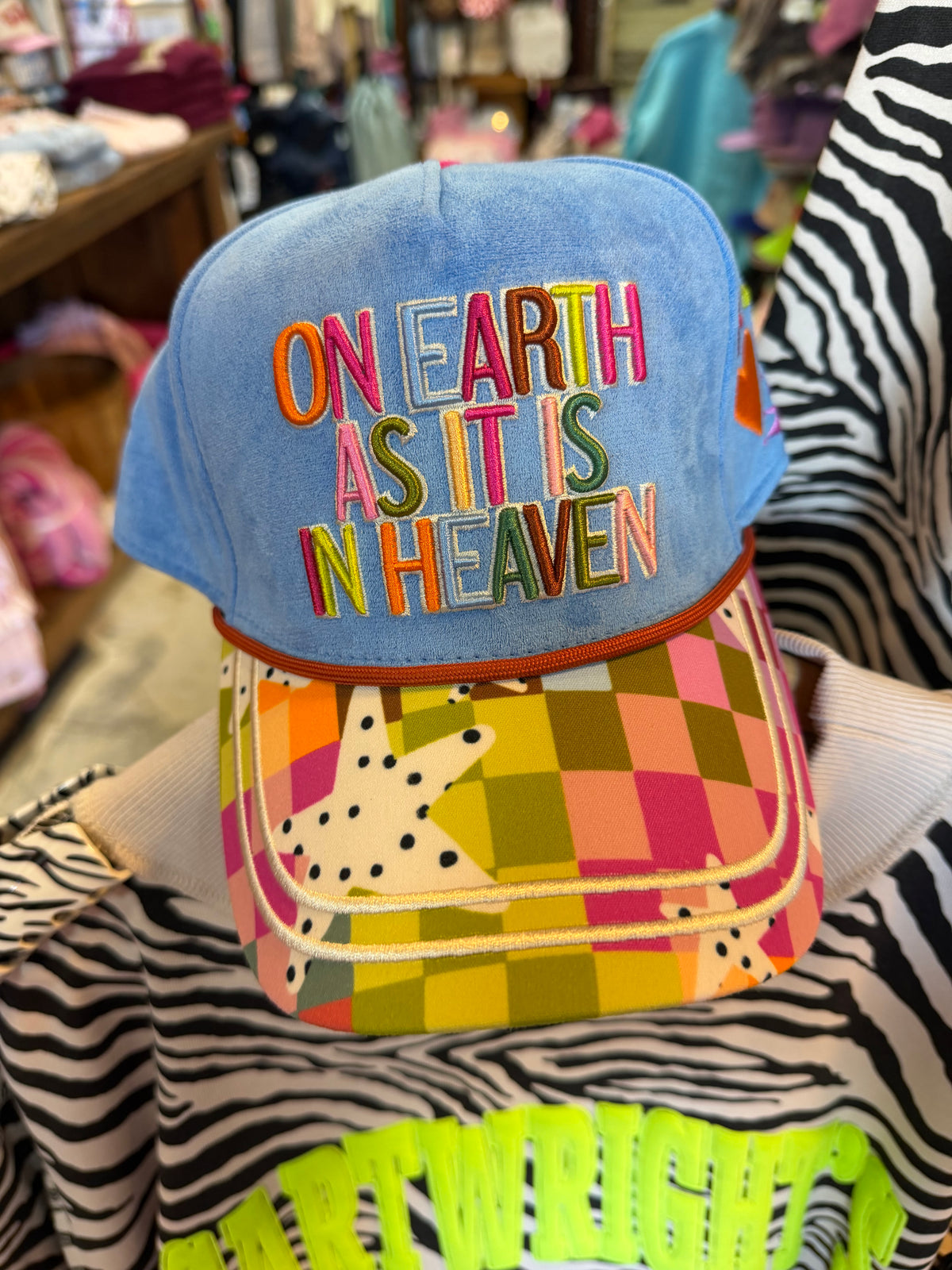 On Earth As It Is Heaven Trucker Hat