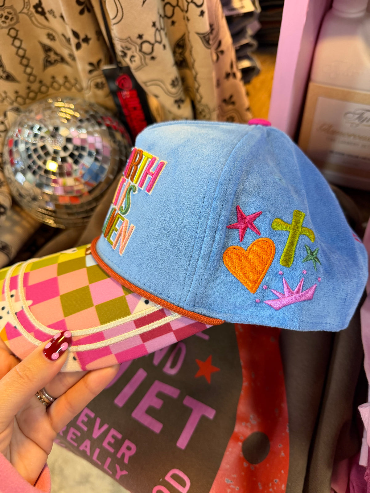 On Earth As It Is Heaven Trucker Hat